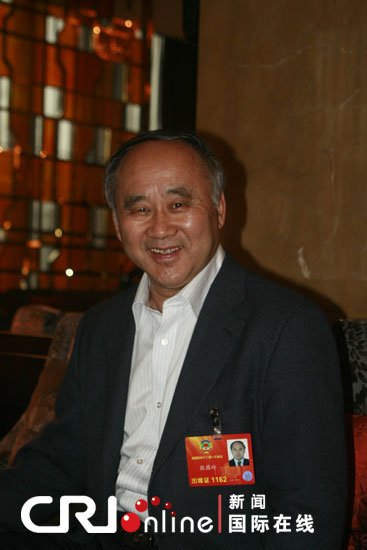 原文配圖:全國(guó)政協(xié)委員張?zhí)N嶺。